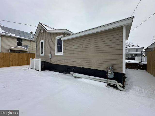 view of snow covered property