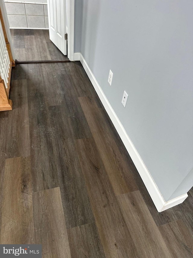 interior details featuring hardwood / wood-style flooring