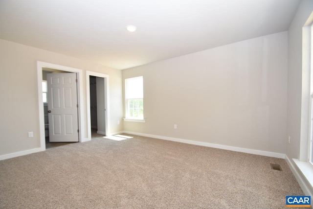 unfurnished bedroom featuring carpet