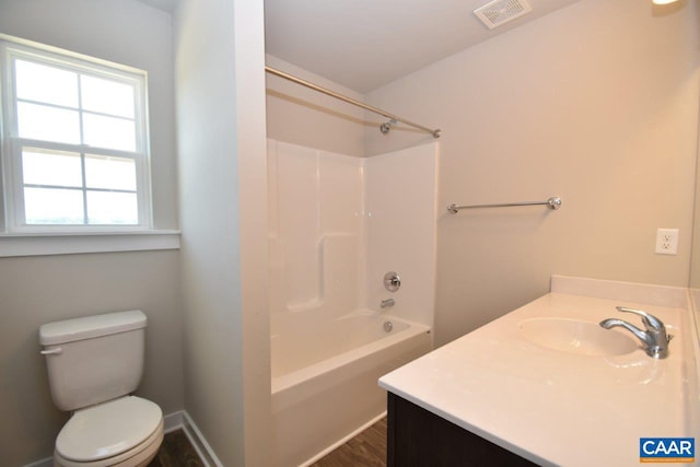 full bathroom with vanity, toilet, and shower / washtub combination