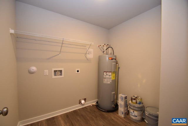 washroom with water heater, hookup for a washing machine, dark hardwood / wood-style floors, and hookup for an electric dryer