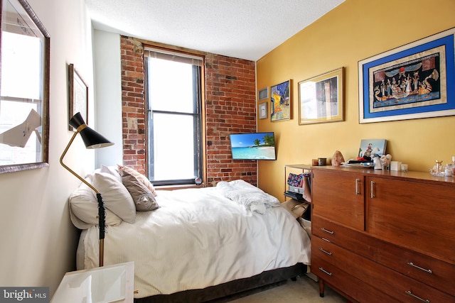 bedroom featuring a textured ceiling