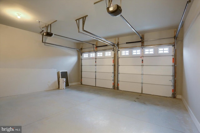 garage featuring a garage door opener