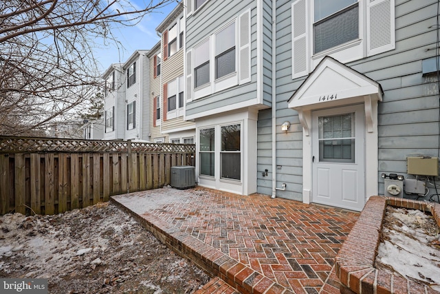 exterior space featuring central AC and a patio