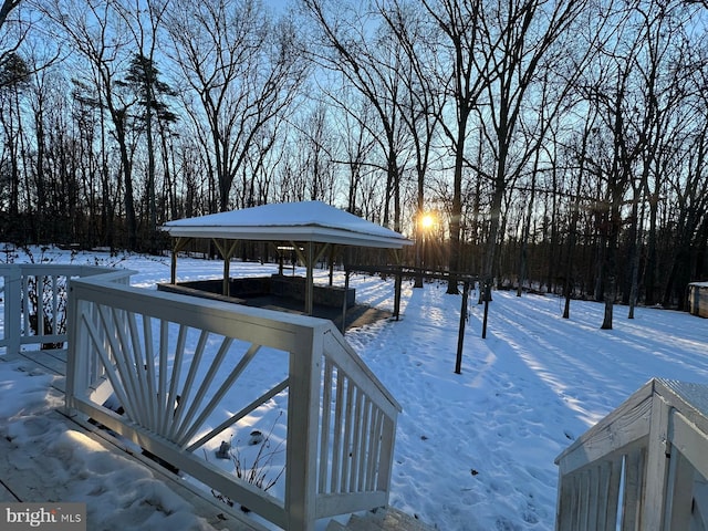 view of snow covered deck