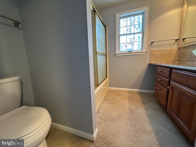 full bathroom with toilet, combined bath / shower with glass door, decorative backsplash, and vanity