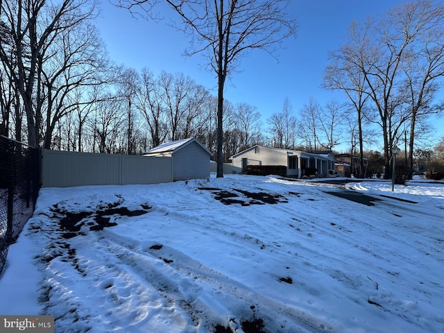 view of yard covered in snow