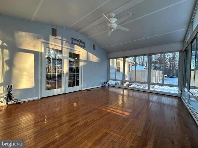 interior space with ceiling fan, lofted ceiling with beams, and french doors