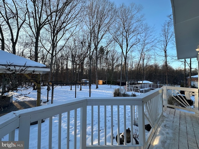 view of snow covered deck