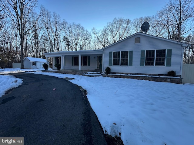 view of front of home featuring covered porch