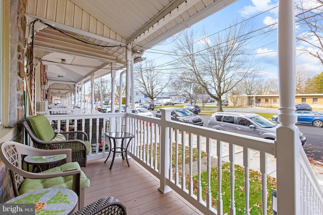 wooden deck with a porch