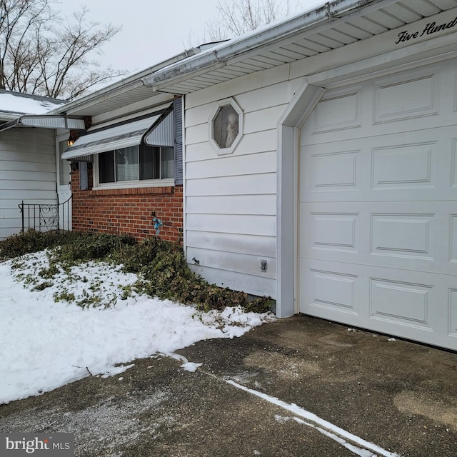 exterior space with a garage