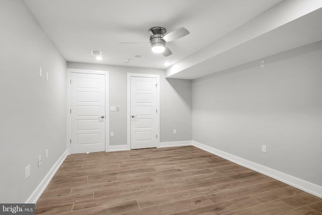 basement featuring ceiling fan