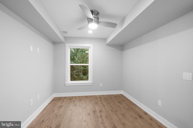 additional living space featuring light hardwood / wood-style floors and ceiling fan