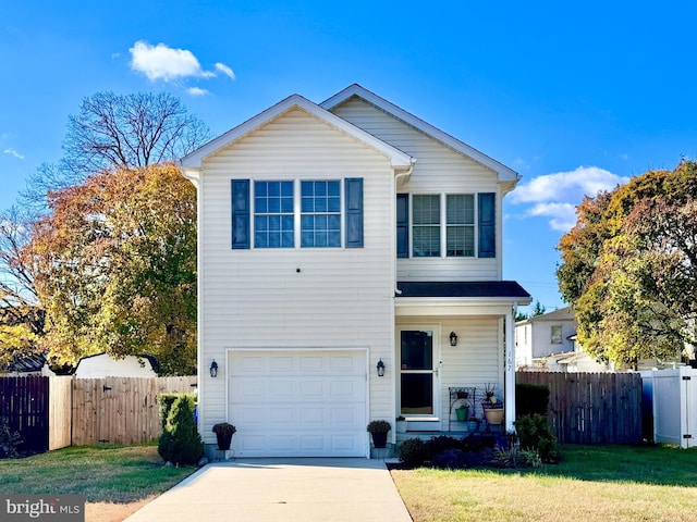 front facade featuring a garage and a front lawn