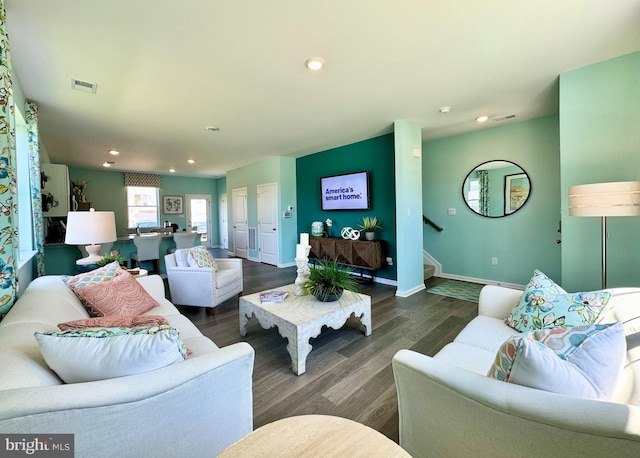 living room featuring dark hardwood / wood-style floors