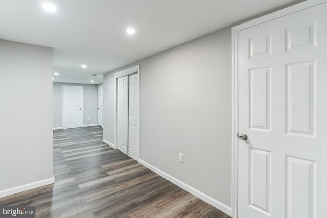 hallway featuring dark hardwood / wood-style floors