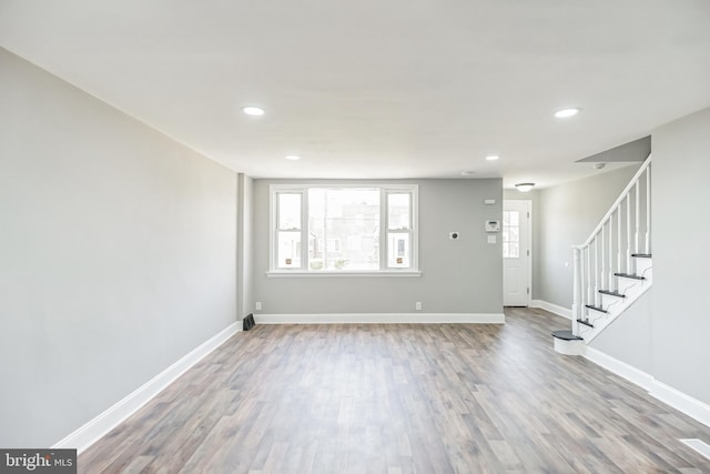 interior space with hardwood / wood-style flooring