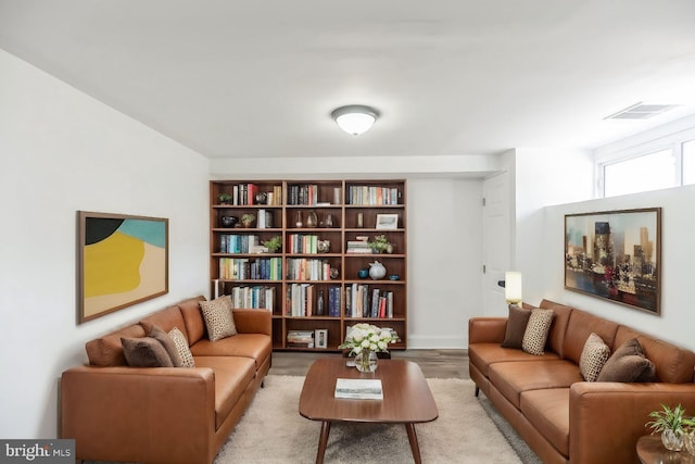 sitting room with light wood-type flooring