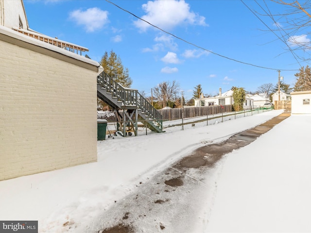 view of snowy yard