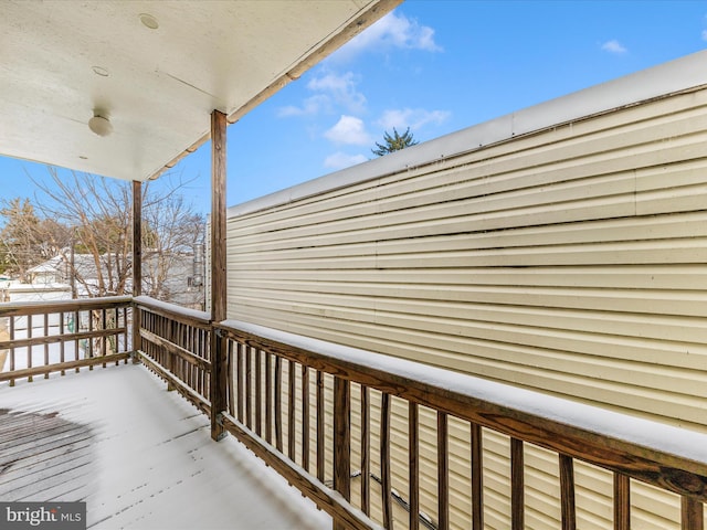 view of snow covered deck