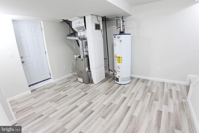 utility room with gas water heater and heating unit