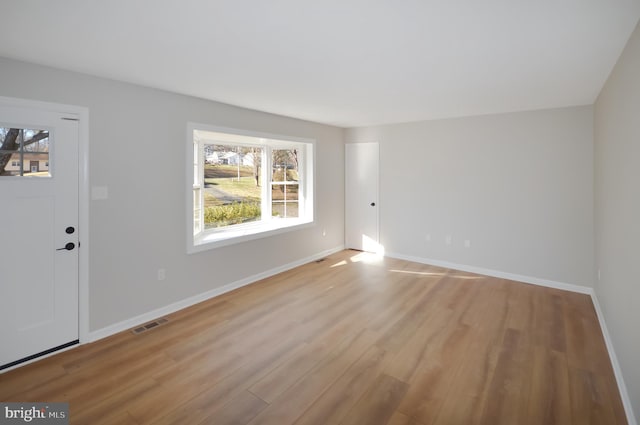 foyer with light wood-type flooring