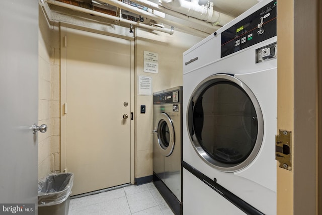 laundry room featuring separate washer and dryer