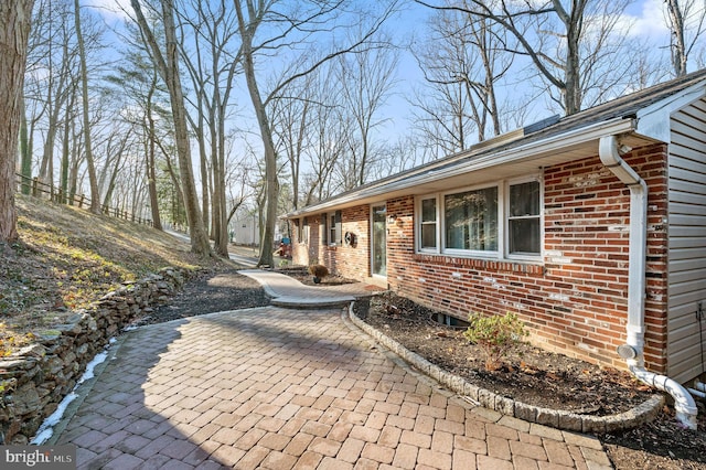 property entrance with a patio