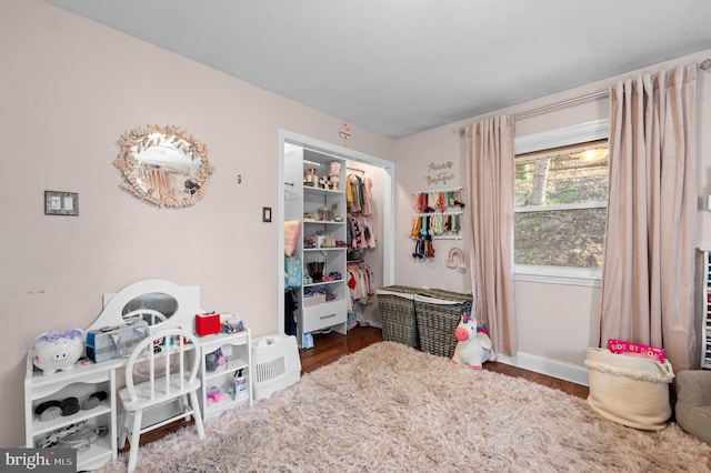 bedroom with hardwood / wood-style flooring