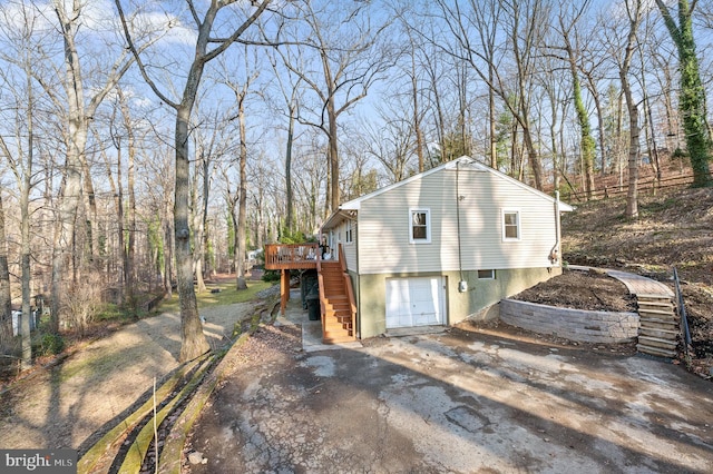 view of home's exterior featuring a deck