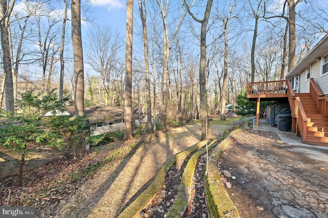 view of yard with a deck