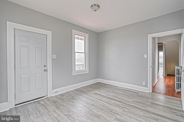 foyer entrance featuring light wood-type flooring