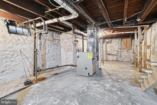 basement featuring water heater