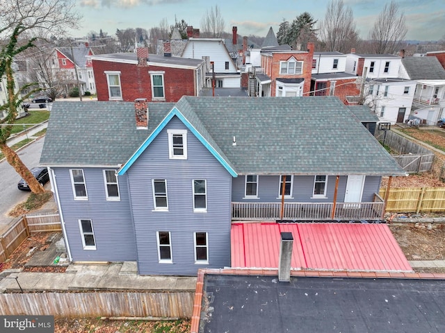 view of front of property with a wooden deck