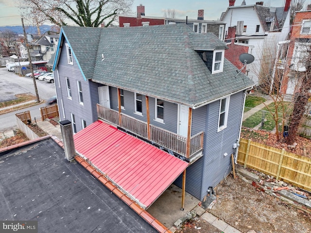 view of front of property with a balcony