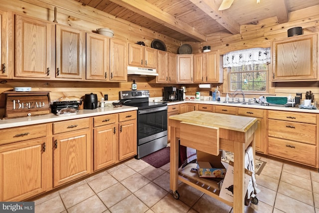 kitchen featuring stainless steel range with electric stovetop, beam ceiling, light tile patterned flooring, and sink