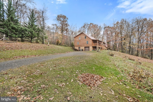 exterior space with a yard and a deck