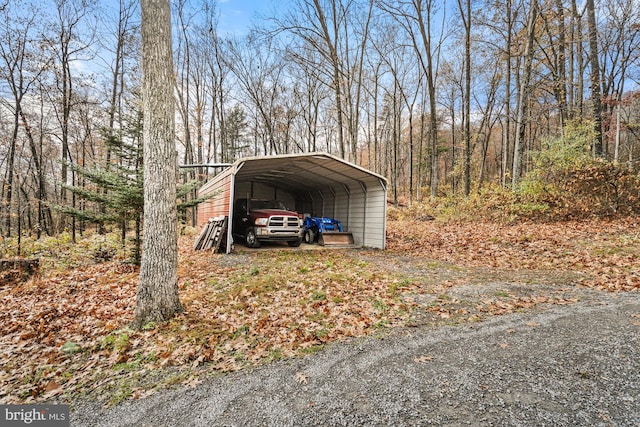 view of outbuilding featuring a carport