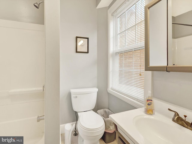 full bathroom featuring vanity, toilet, and shower / bathtub combination