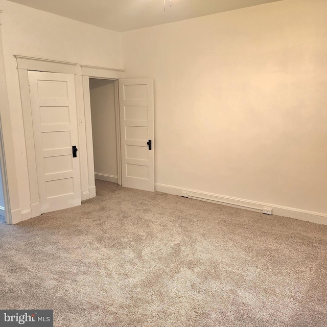 unfurnished bedroom featuring carpet floors