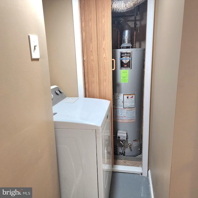 clothes washing area with water heater