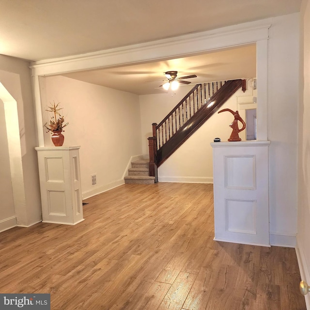 interior space featuring ceiling fan and light wood-type flooring