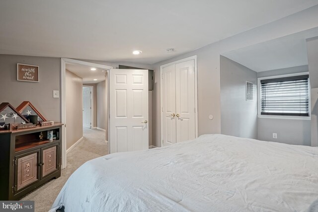 bedroom with light carpet