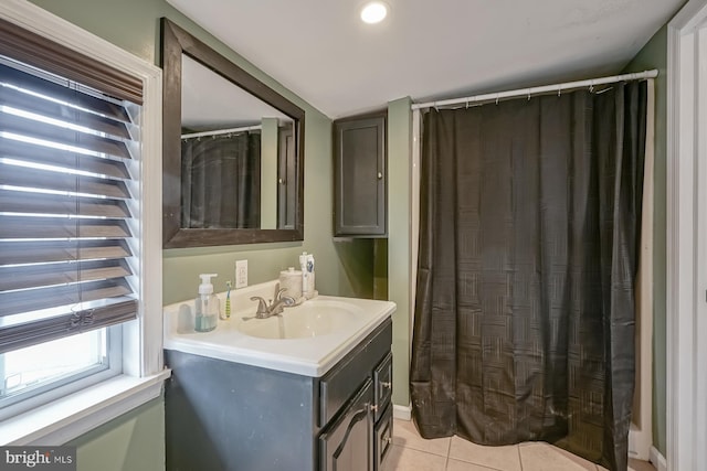 bathroom featuring tile patterned floors and vanity