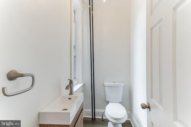 bathroom with sink and toilet