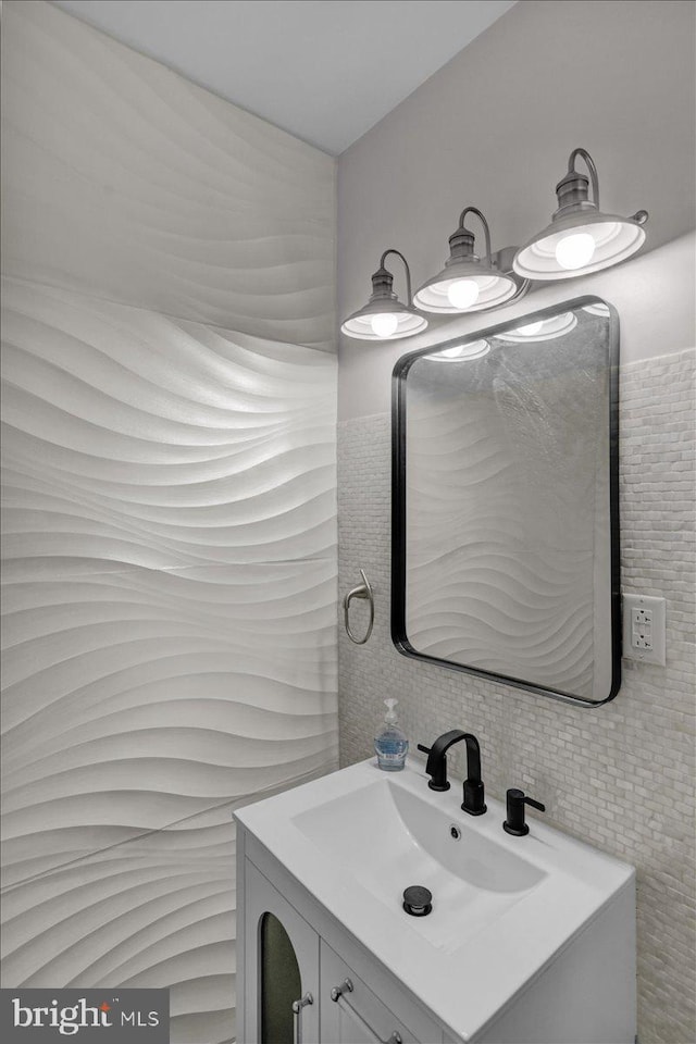 bathroom with backsplash and vanity