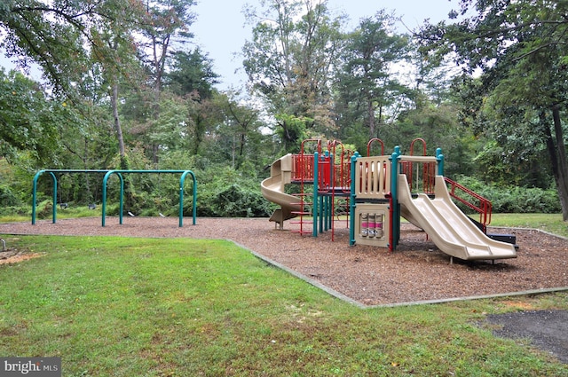 view of playground featuring a lawn