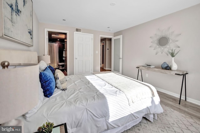 bedroom featuring light wood-type flooring