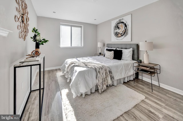 bedroom featuring light hardwood / wood-style floors